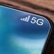 Smartphone mit 5G Zeichen auf Screen
