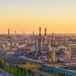 Aerial drone view of petrol industrial zone or oil refinery in Yaroslavl, Russia during sunset time. Banner wide format.
