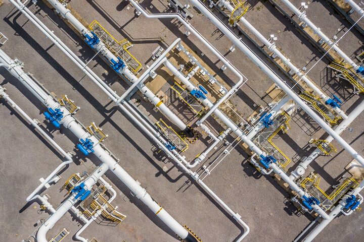 Aerial top view natural gas pipeline, gas industry, gas transport system, stop valves and appliances for gas pumping station.