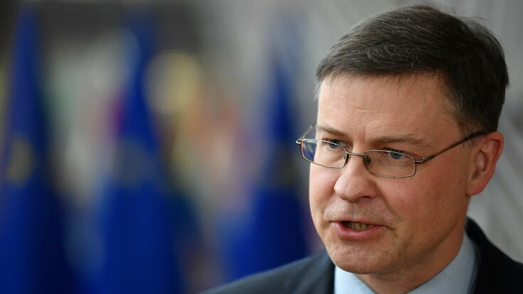 © AFP European Commissioner for Trade Valdis Dombrovskis answers journalists' questions ahead of a Eurogroup meeting at the EU headquarters in Brussels on March 14, 2022. (Photo by John THYS / AFP)