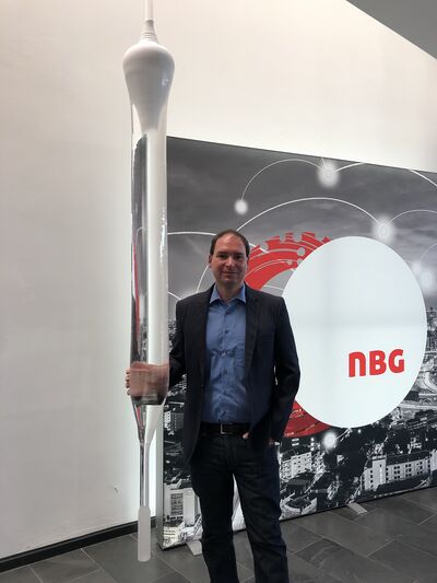 Christian Zwettler, CTO NBG Fiber, mit mit Glasfaser-Preform