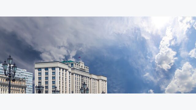 Building of The State Duma of the Federal Assembly of Russian Federation on a cloud background, Moscow, Russia