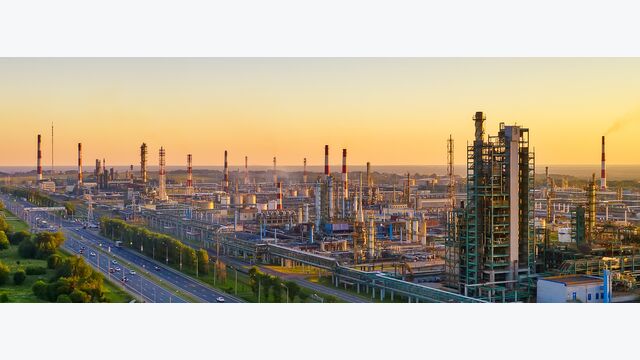 Aerial drone view of petrol industrial zone or oil refinery in Yaroslavl, Russia during sunset time. Banner wide format.