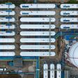 Aerial top view LPG Liquefied Petroleum Gas storage tank, LPG gas storage tank and pipeline industrial plant, LPG distribution station facility and gas manufacturing industry.