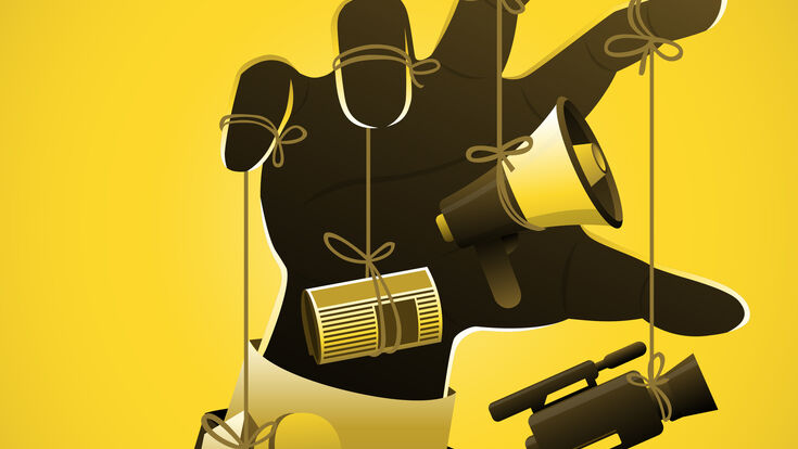 © Getty Images/iStockphoto An illustration of businessman arm controling media manipulation