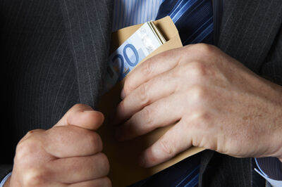 © Getty Images/iStockphoto Image depicting corporate greed and corruption