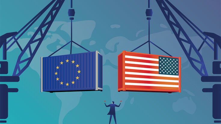 © Getty Images Business men command the tower crane to lift American containers and EU containers