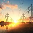 Sunrise solar power concept high voltage pylons transfer sustainable electricity