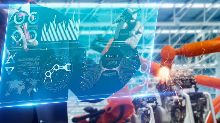 © yingyaipumi - stock.adobe.com Roboter in moderner Fahrzeugfertigung