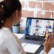 Young Asian businesswoman work at home and virtual video conference meeting with colleagues business people, online working, video call due to social distancing at home office