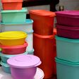 Cairo, Egypt, February 4 2021: pile of several and many Tupperware plastic products, Tupperware Corporation, an American multinational company produces plastic food storage containers and bottles