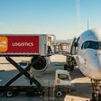 Cargo airplane being loaded with TEMU goods out of a logistic container
