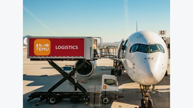 Cargo airplane being loaded with TEMU goods out of a logistic container