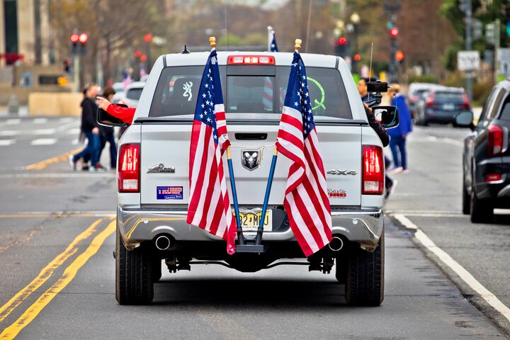 Washington DC, USA March 24 2022: Donald Trump 2024 presidential nomination supporters car rally through National Mall of Washington streets.