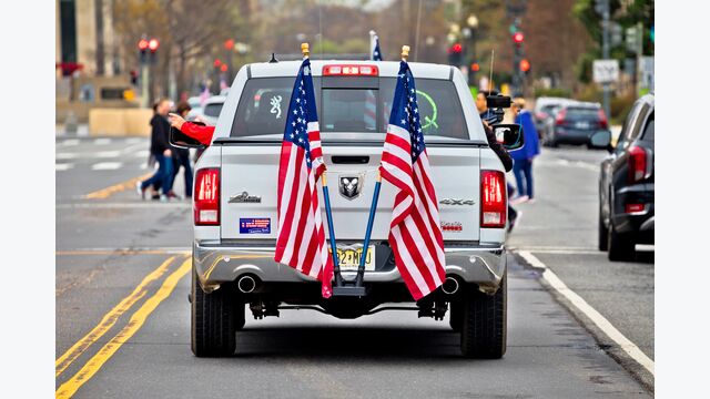 Washington DC, USA March 24 2022: Donald Trump 2024 presidential nomination supporters car rally through National Mall of Washington streets.