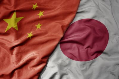 © luzitanija - stock.adobe.com big waving national colorful flag of china and national flag of japan . macro