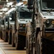 Military vehicles lined up in facto