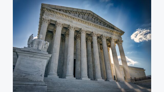 A summer day in front of the US Supreme Court Building in Washington, DC.