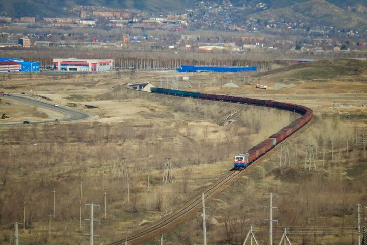 Freight train - Cargo transportation. Cargo railroad industry. Locomotive. Ust-Kamenogorsk (kazakhstan)