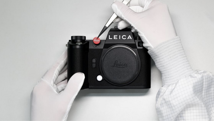 Leica Kamera roter Punkt Produktion