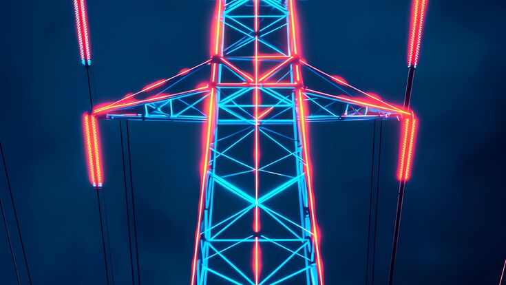 High voltage power line tower illuminated in neon colors against a dark stormy sky, showcasing modern energy infrastructure.