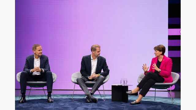 Oliver Blume (CEO, Volkswagen Group & Porsche AG) and Peter Bosch (CEO, CARIAD) in conversation with Hildegard Müller (President, German Association of the Automotive Industry) at the Opening Talk: Software as Driver for the European Automative Industry